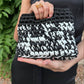 Pochette in lycra nera e bianca