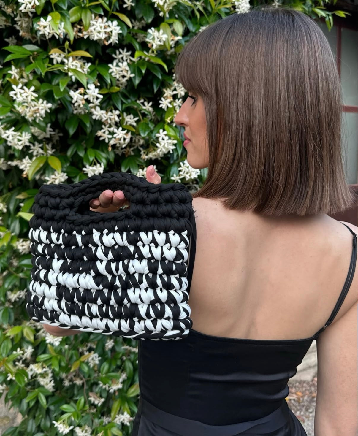 Pochette in lycra nera e bianca