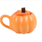 Tazza in ceramica a forma di zucca arancione con calzini in spugna