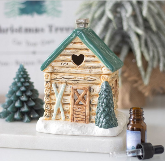 Bruciatore di olio a forma di chalet con sci